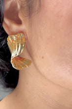 Load and play video in Gallery viewer, Golden Twist Earrings
